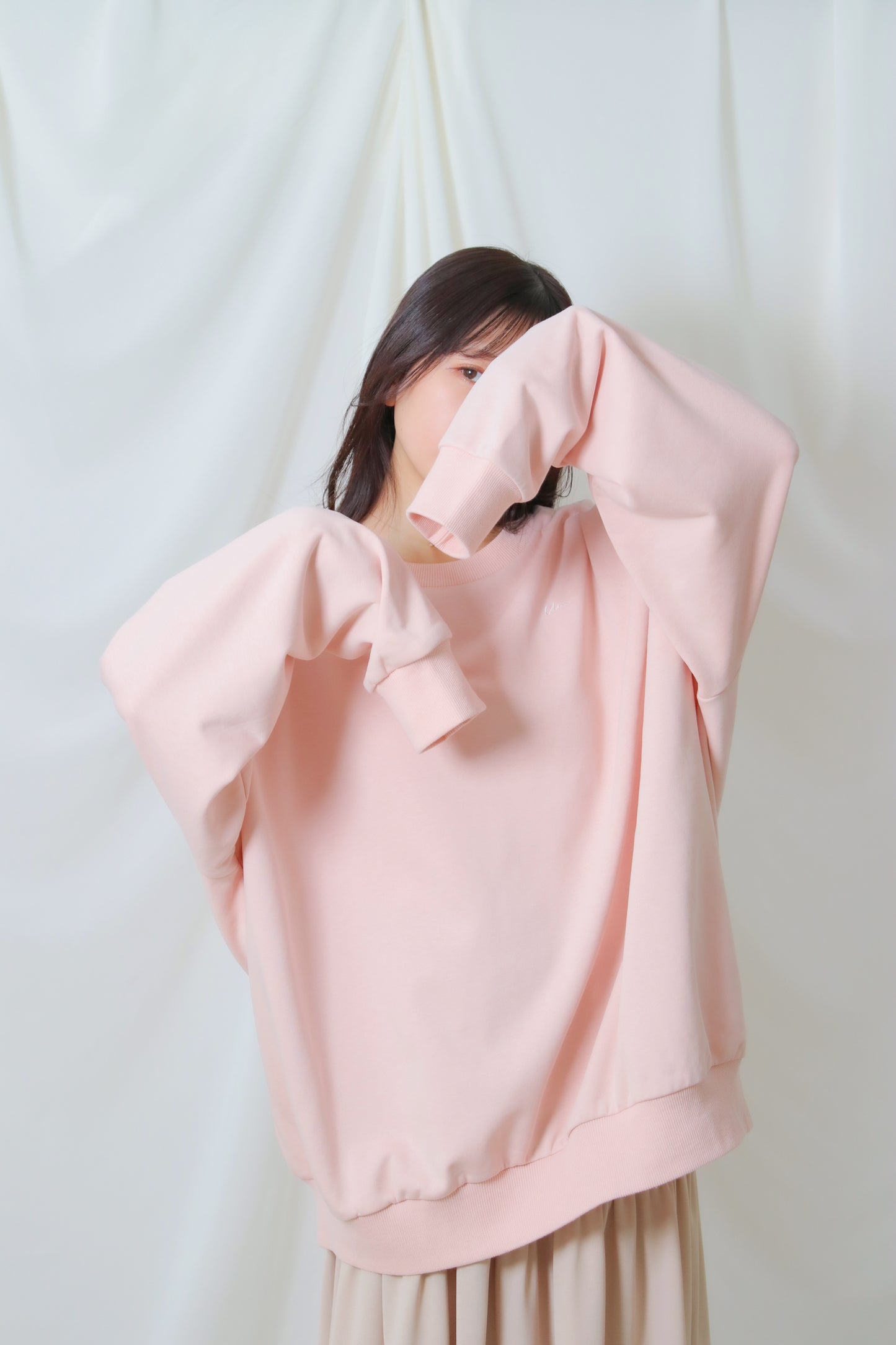 umm. logo over sweat