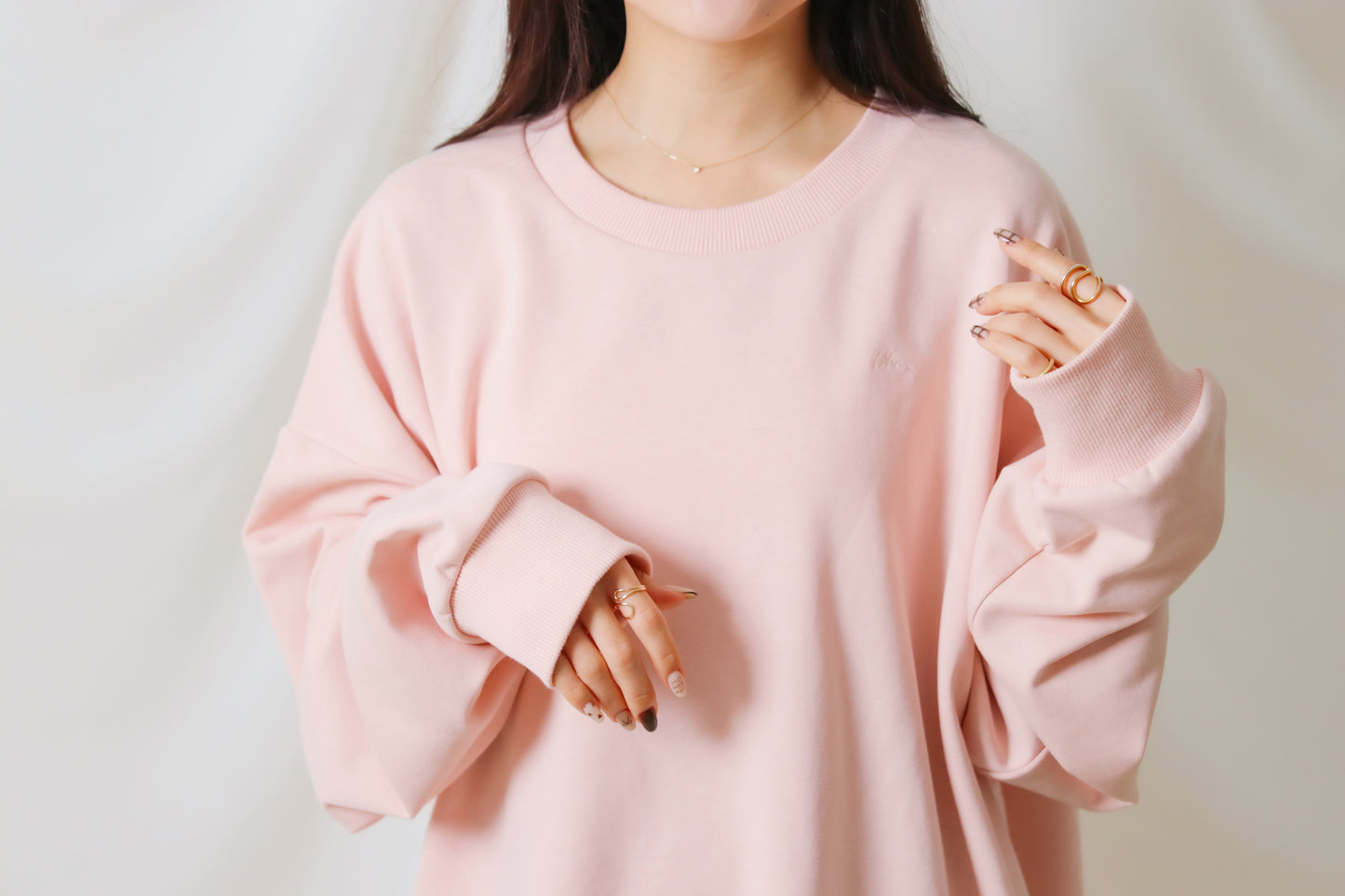 umm. logo over sweat