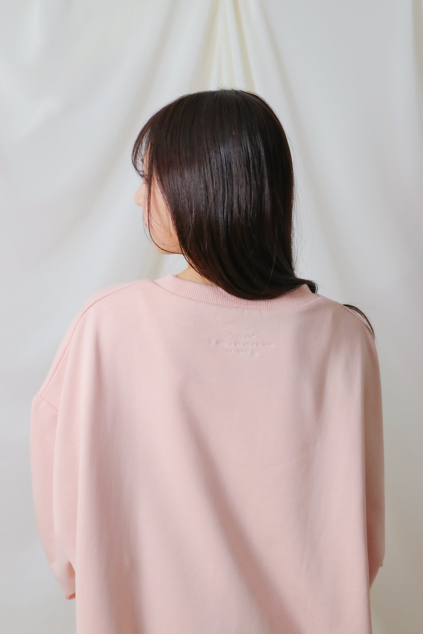 umm. logo over sweat