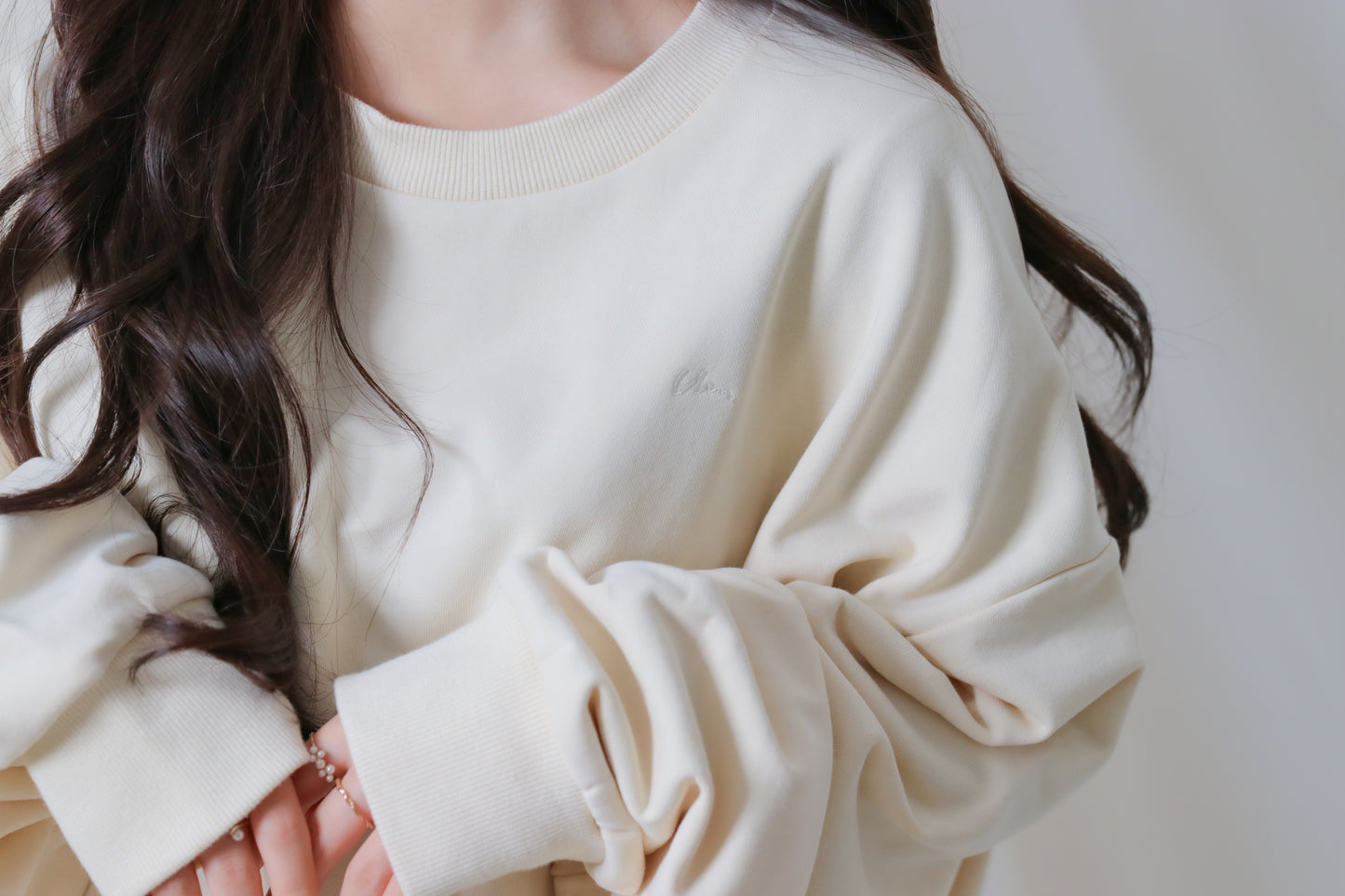 umm. logo over sweat