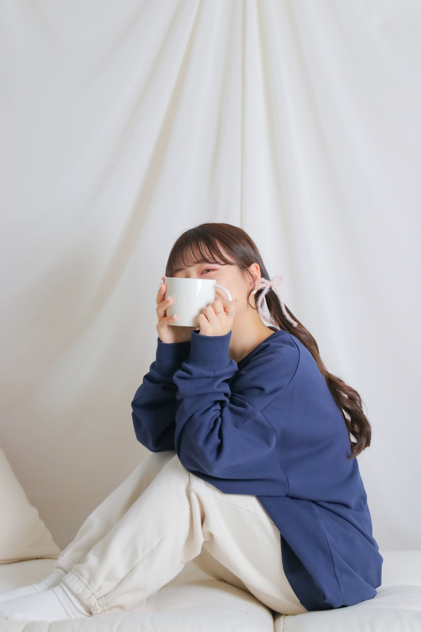 umm. logo over sweat