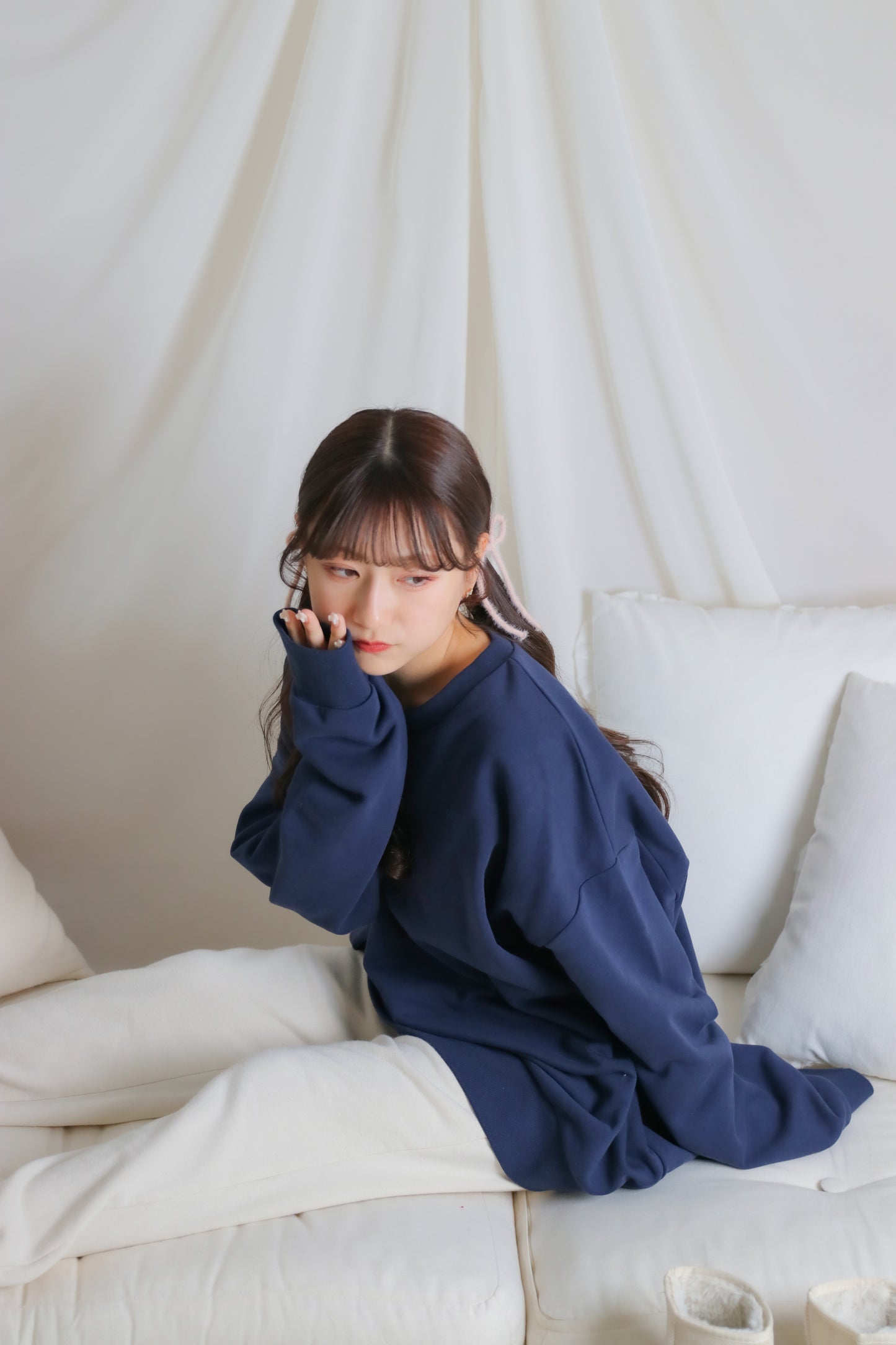 umm. logo over sweat