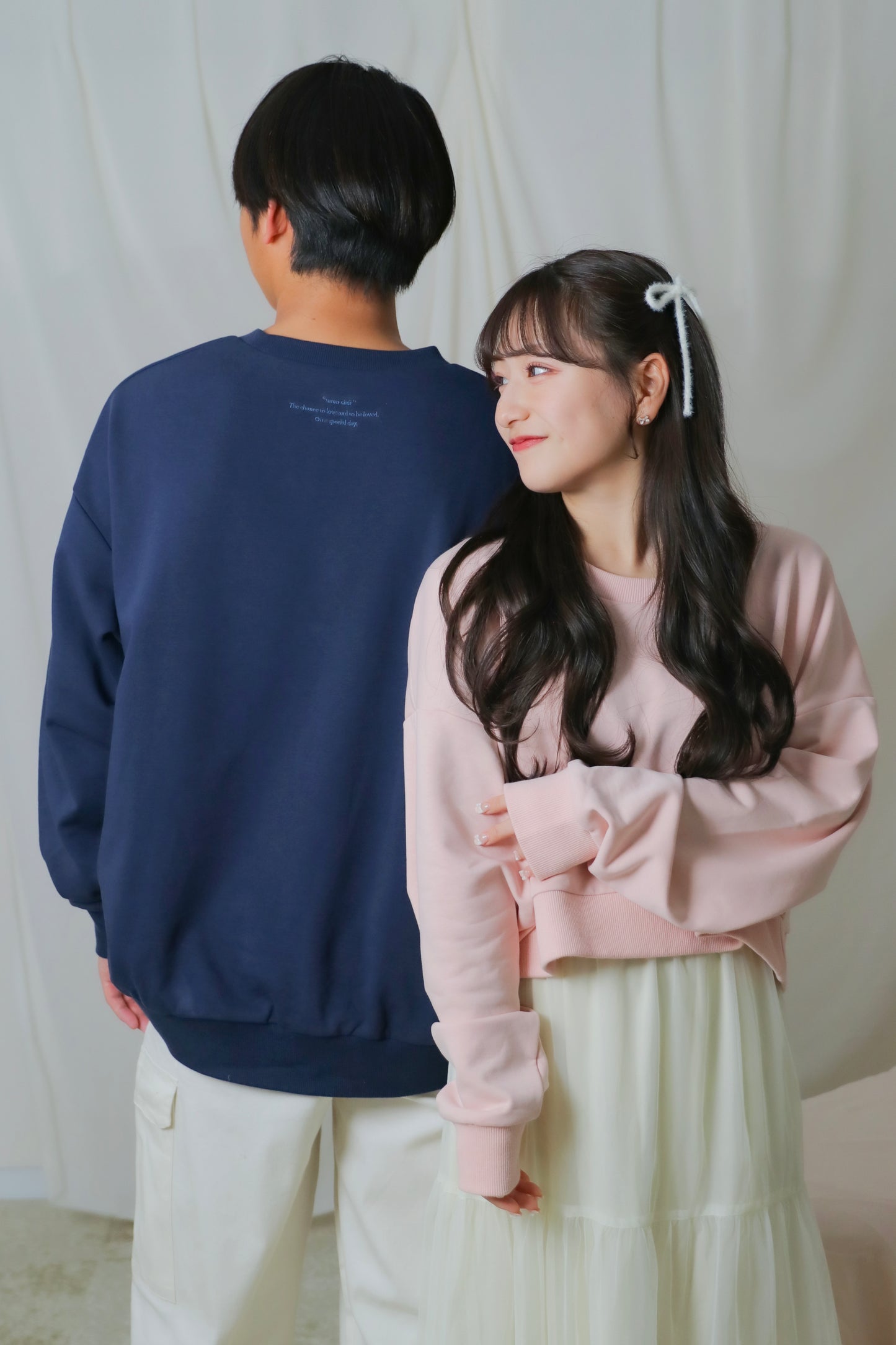 umm. logo over sweat
