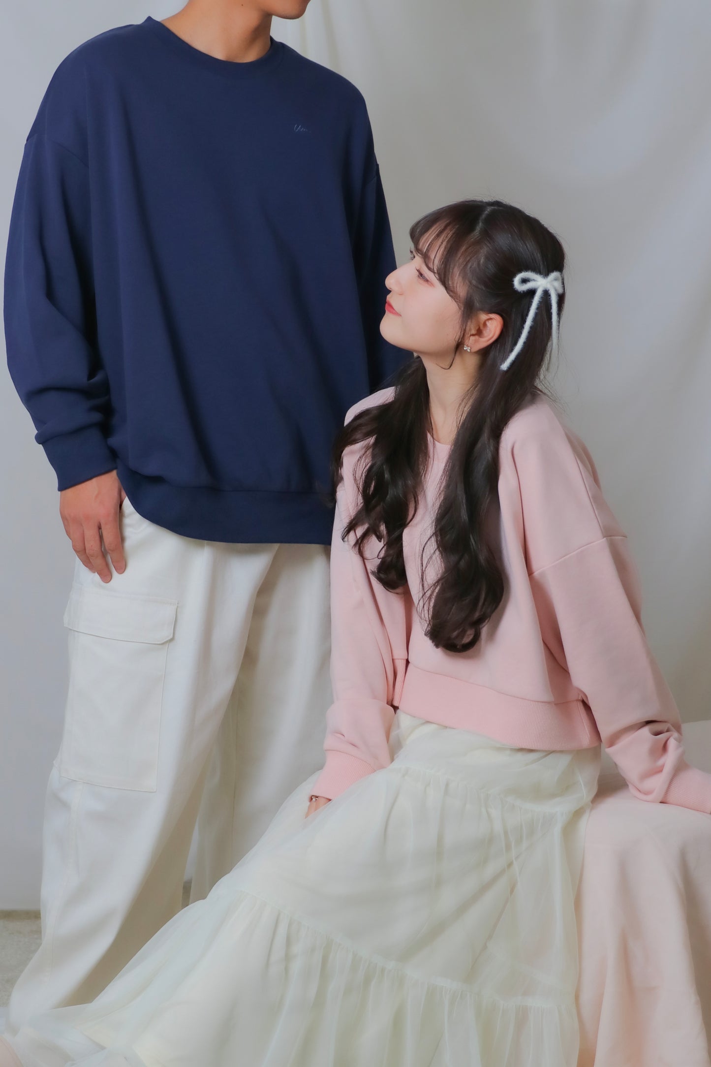 umm. logo over sweat