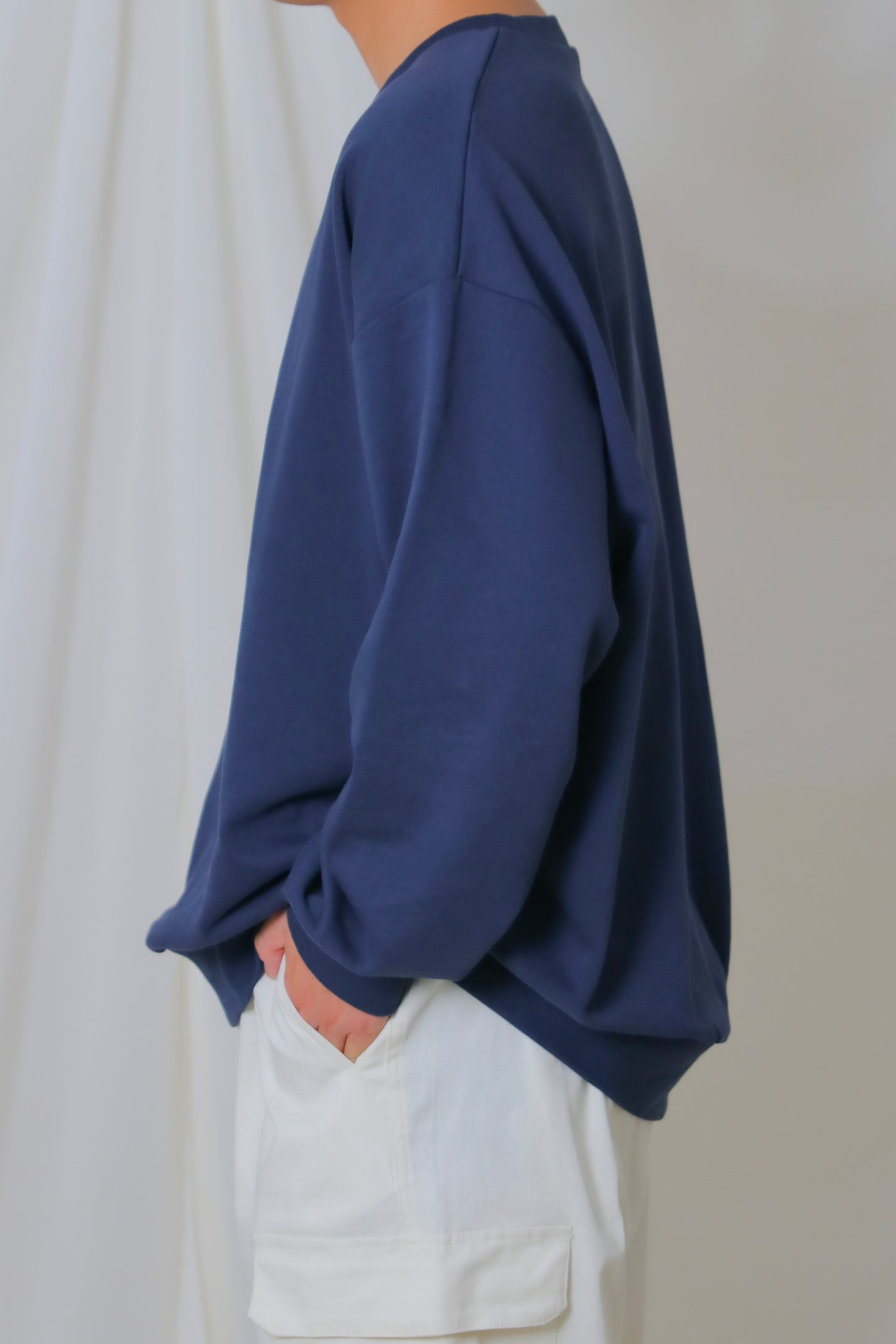 umm. logo over sweat