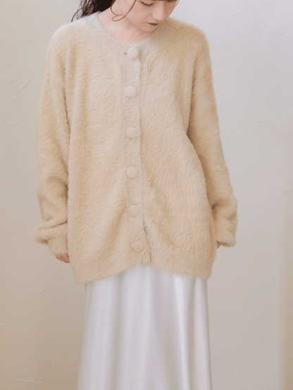 shaggy over cardigan